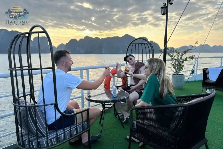 Tourists enjoying sunset on a one-day cruise